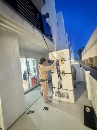 Team members with moving boxes